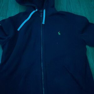 This is a navy blue polo zip up size small it’s to small I grew out of it.